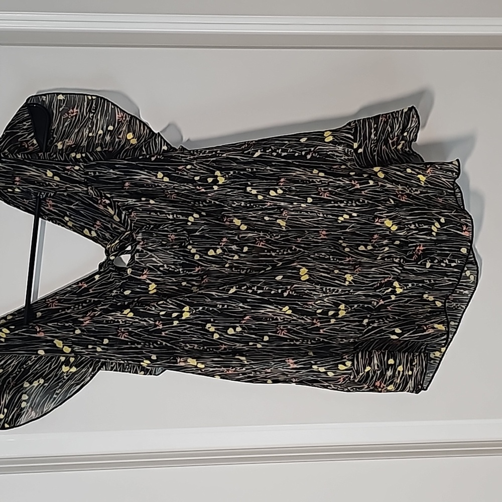 Black sheer top with floral print